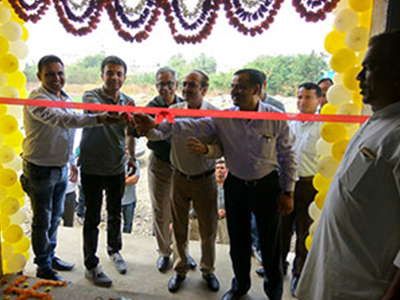 Aries Agro people having ribbon cut event
